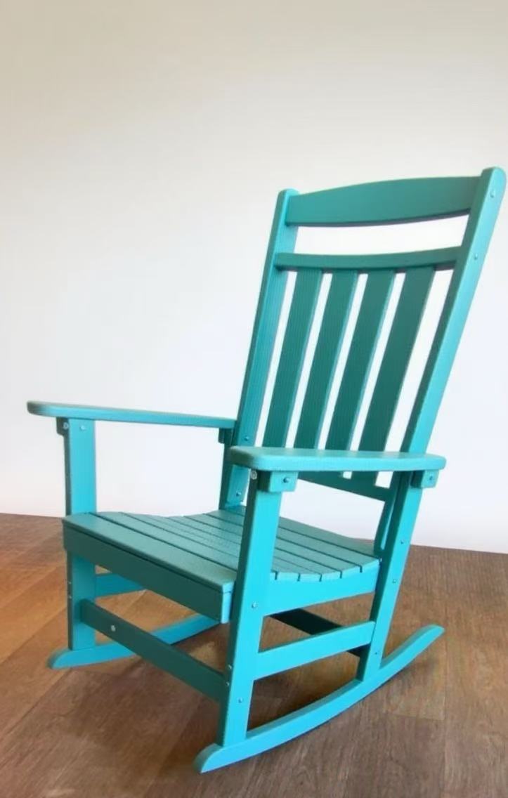 Brown wooden high back rocking chair